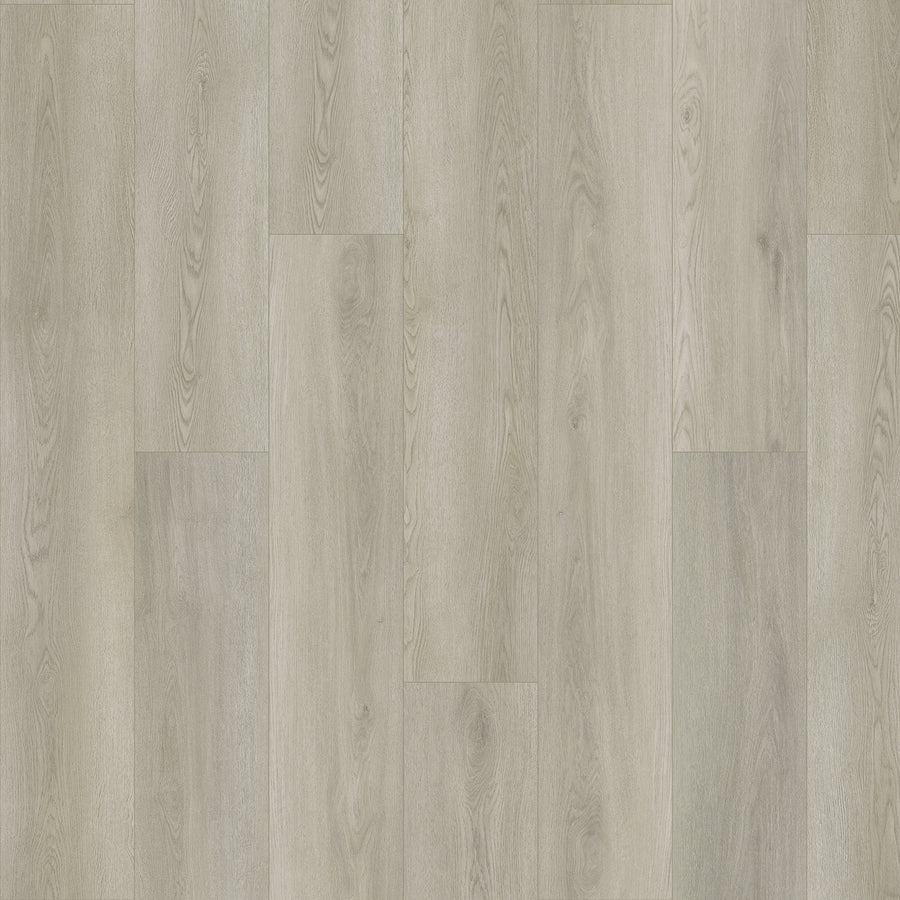Amber Escape 9" Vinyl Plank features light gray wide planks with a natural grain pattern and subtle tone variations. Its scratch-resistant surface adds a smooth, modern look in a staggered layout—ideal for contemporary spaces.