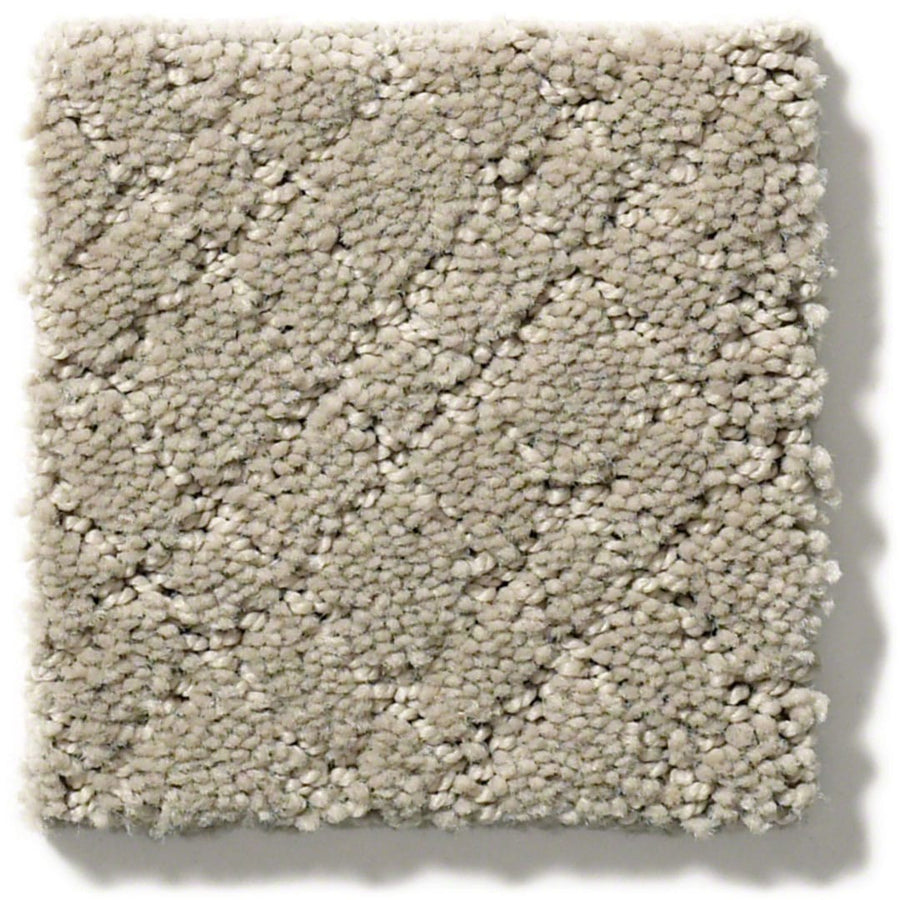 A square sample of Mosaic Family Friendly Carpet in light beige, featuring a subtle diagonal organic cut-and-loop pattern and a soft, plush surface made from durable continuous filament nylon.