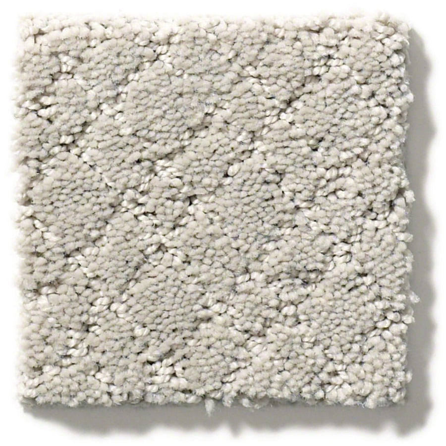 The Mosaic Family Friendly Carpet is a square swatch of light gray with a subtle diamond pattern and a soft, textured surface made from durable, stain-resistant continuous filament nylon.