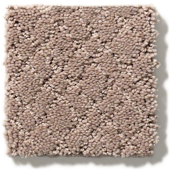 A square sample of Mosaic Family Friendly Carpet shows light beige, textured continuous filament nylon fibers with a subtle, raised diamond cut-and-loop pattern, offering a plush and comfortable look.