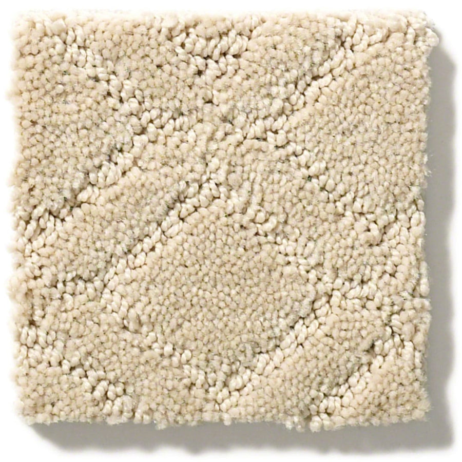 A square sample of Muse On Trend Carpet in beige, featuring a subtle diamond pattern with textured loops for a soft, neutral look.