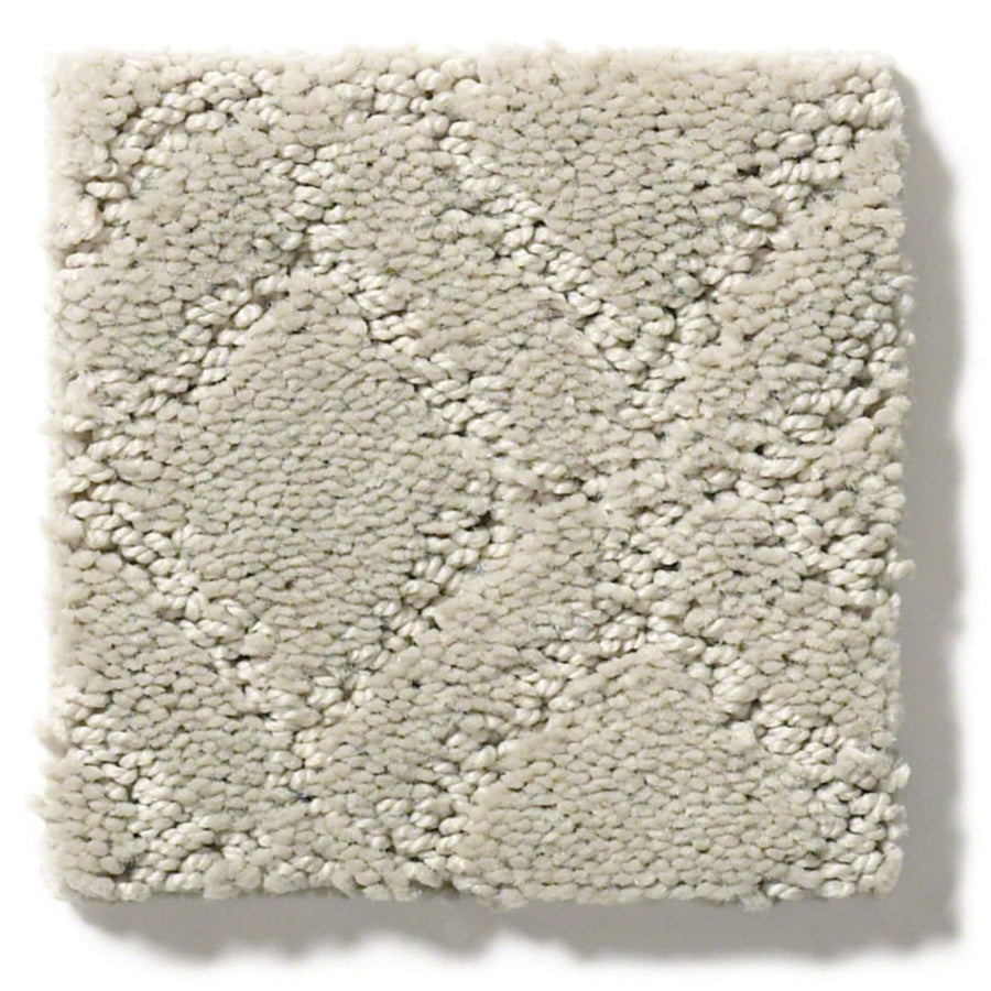 The Muse On Trend Carpet features a square swatch of light beige, textured plush fibers with a continuous geometric diamond pattern. Its neutral shades create a cozy, inviting look that suits any space.