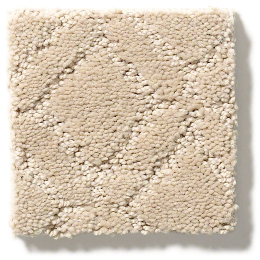A square sample of Muse On Trend Carpet in beige, featuring a subtle box grid pattern and soft, looped pile. Its textured fibers and neutral shades create a plush, cozy look.