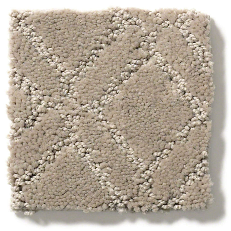 A square sample of Muse On Trend Carpet in beige, featuring a soft, plush texture and a subtle diamond grid pattern formed by lighter raised lines in neutral shades.