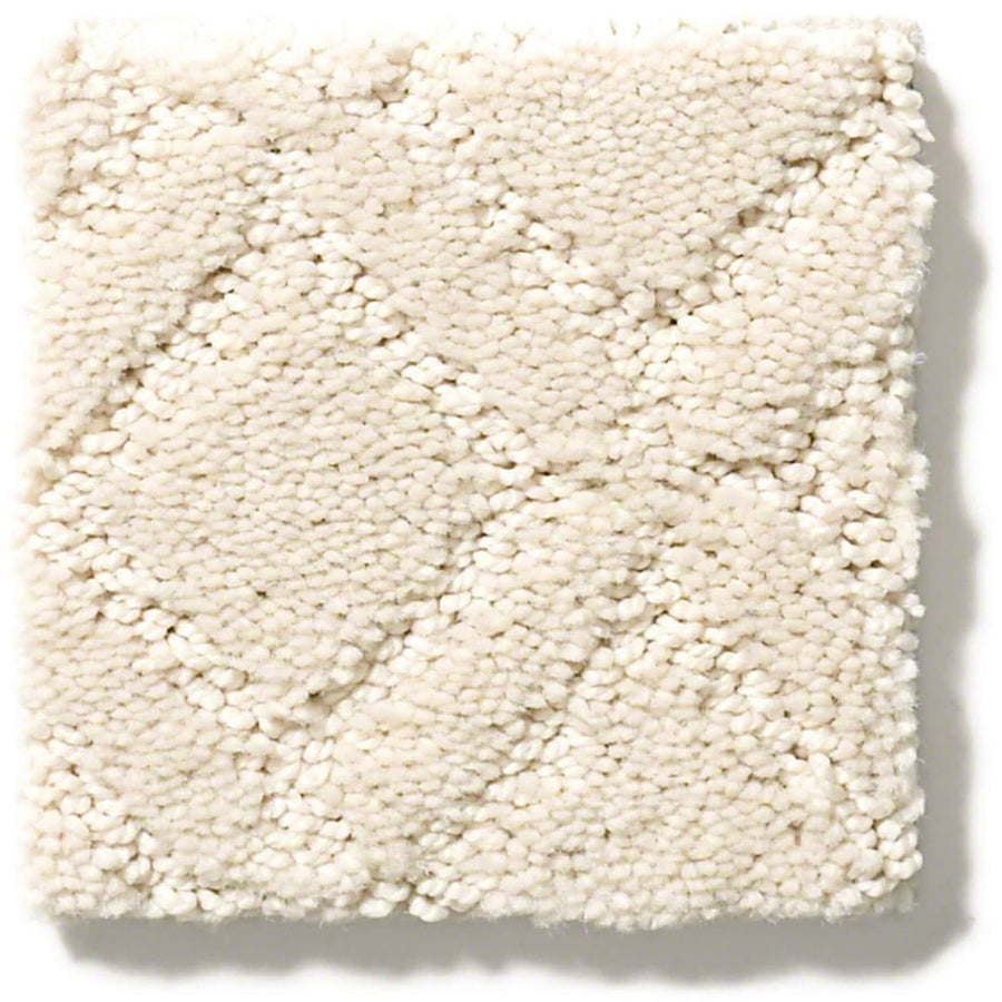 The Muse On Trend Carpet is an off-white, square swatch with a subtle diamond pattern in neutral tones and a plush, looped pile texture.