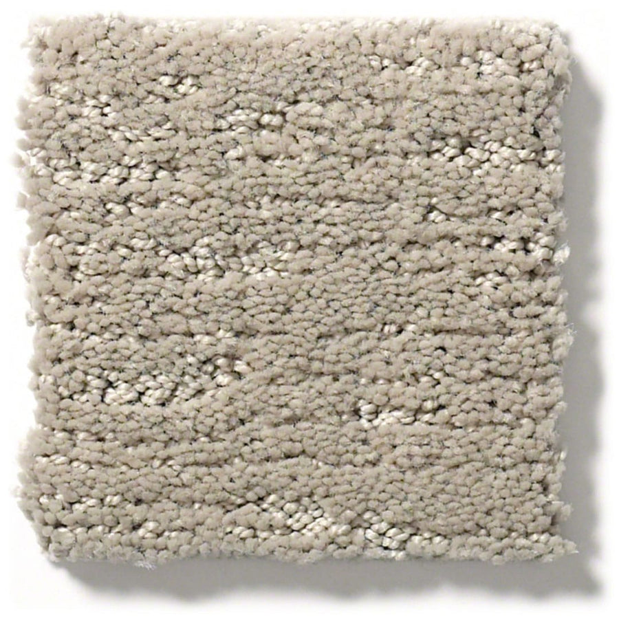 A square sample of Sketch On Trend Carpet in light gray, featuring a soft, plush texture, nature-inspired neutral tones, soil and stain resistance, and a slightly textured surface.