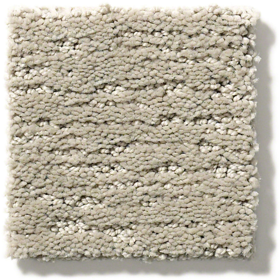 The Sketch On Trend Carpet is a square sample of soil and stain-resistant nylon in light beige, featuring nature-inspired neutrals and a blend of looped and cut fibers for a subtle linear pattern.
