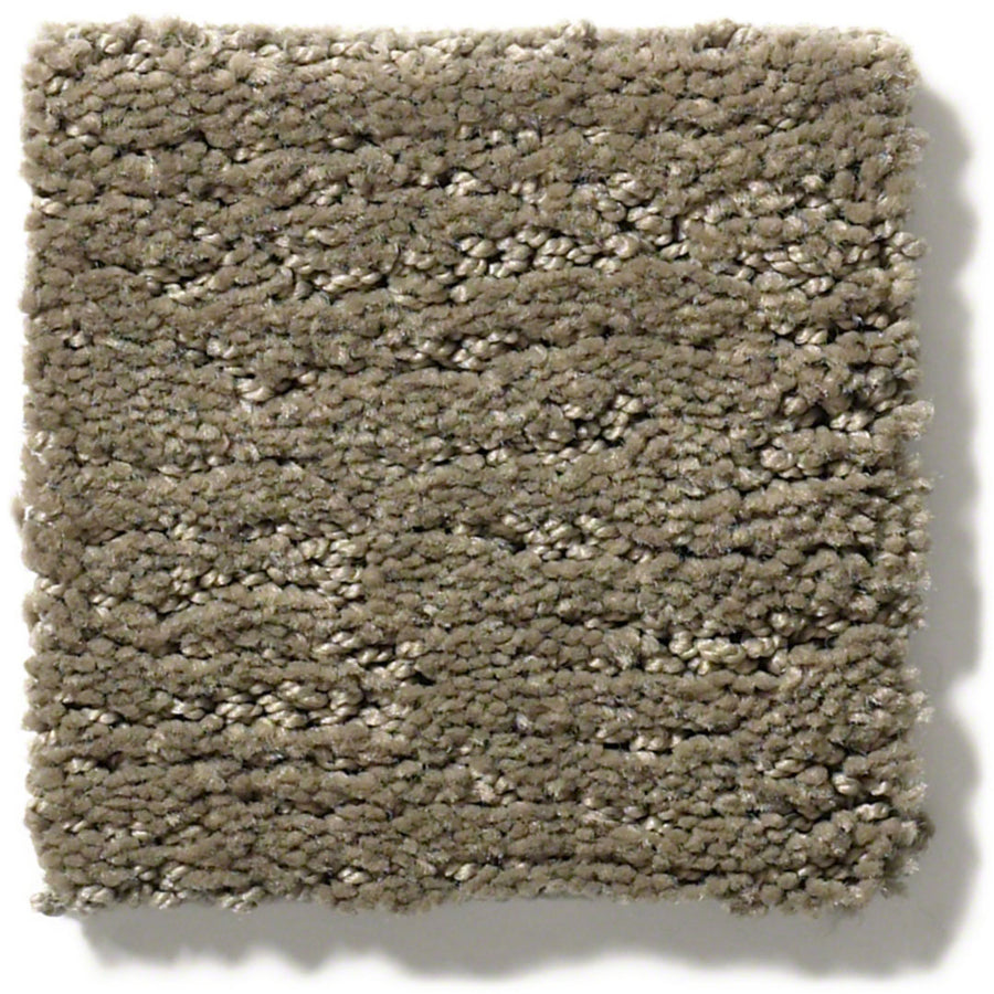 The Sketch On Trend Carpet is a square taupe swatch with a plush looped pile, tan and beige fibers, and durable, soil- and stain-resistant nylon for lasting beauty.
