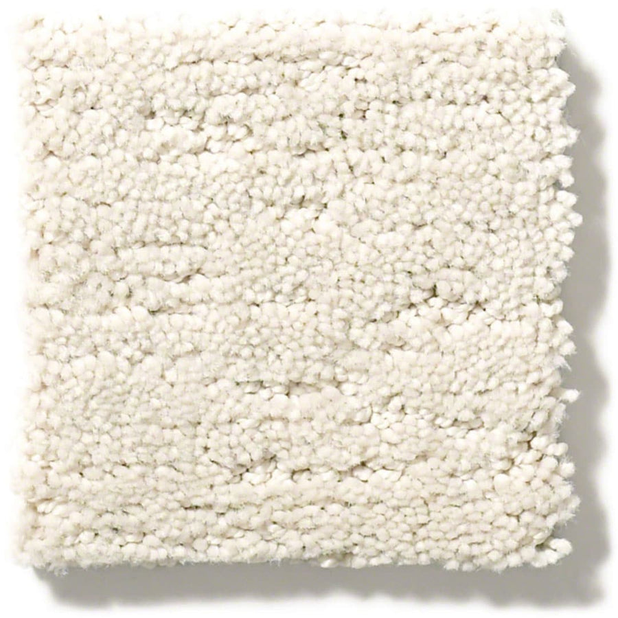 A square sample of Sketch On Trend Carpet in off-white features plush, looped texture and a soft look. Densely packed, stain- and soil-resistant nylon fibers offer lasting beauty and comfort in nature-inspired neutral tones.