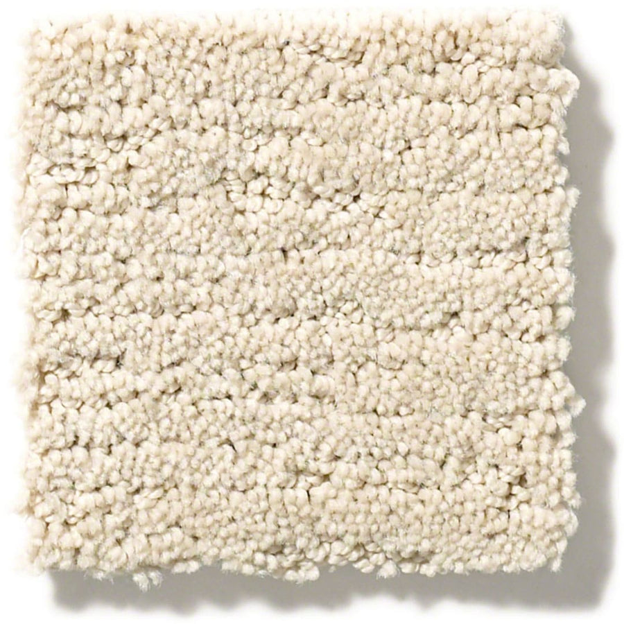 A square sample of Sketch On Trend Carpet, featuring a soft, plush, off-white textured looped pile in a nature-inspired neutral tone, shown on a white background.