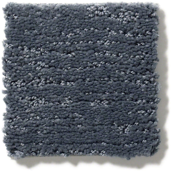 Sketch On Trend Carpet sample: a square, soft, plush dark gray carpet with subtle horizontal stripe patterns in nature-inspired neutral tones.
