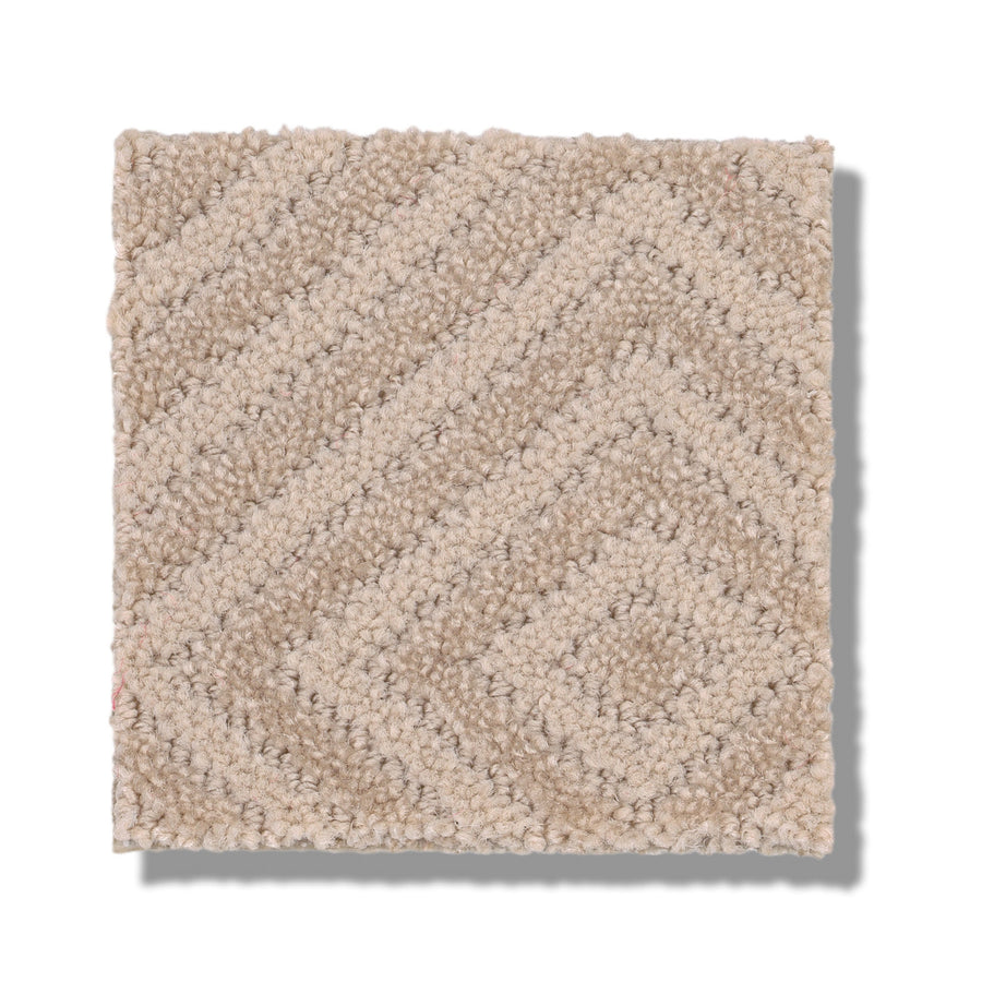 The Aristocrat On Trend Carpet sample is square and beige, featuring a matte finish with a raised geometric pattern of concentric diamonds, displayed on a white background.