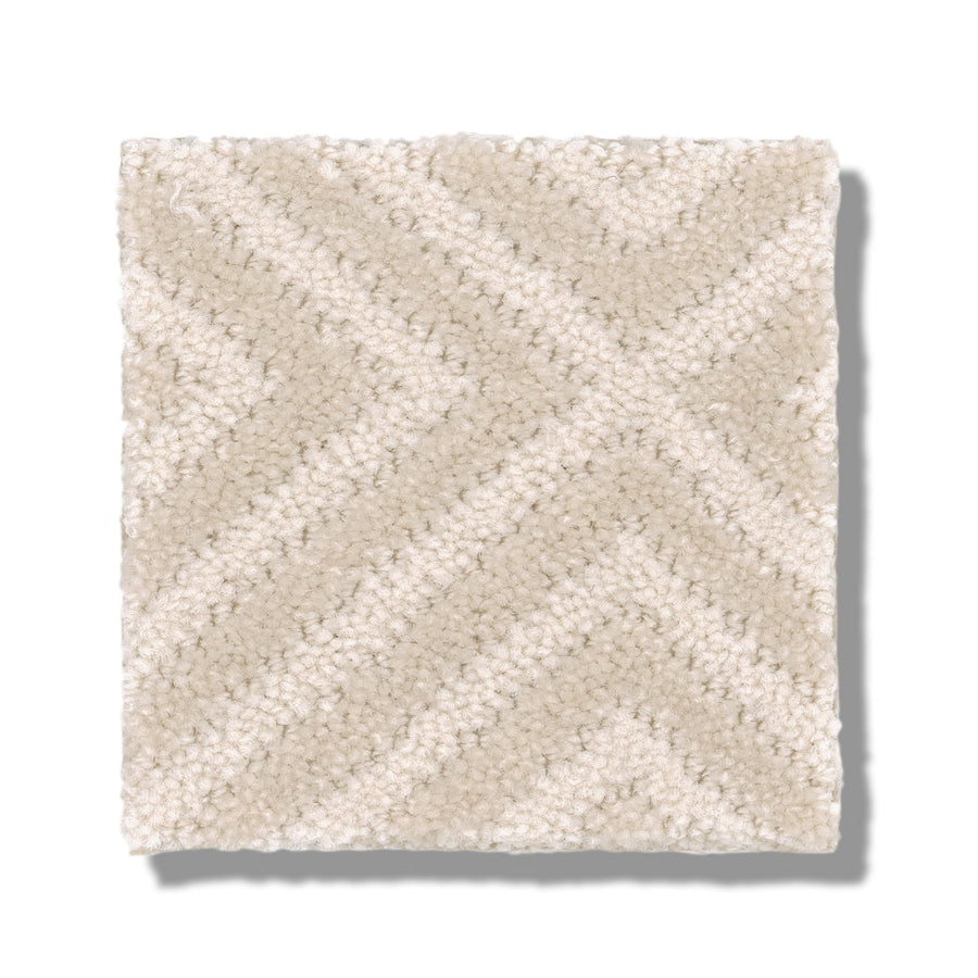 A square swatch of Aristocrat On Trend Carpet in light beige, featuring a textured chevron pattern and subtle matte finish, displayed on a white background.