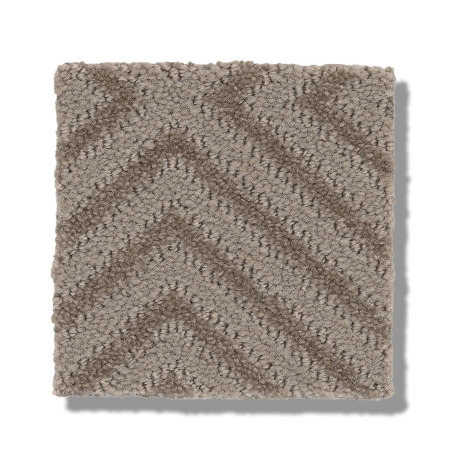 A square sample of Aristocrat On Trend Carpet in taupe shades features a textured chevron pattern and subtle matte finish. Neatly cut edges and a soft, plush surface stand out against the plain white background.