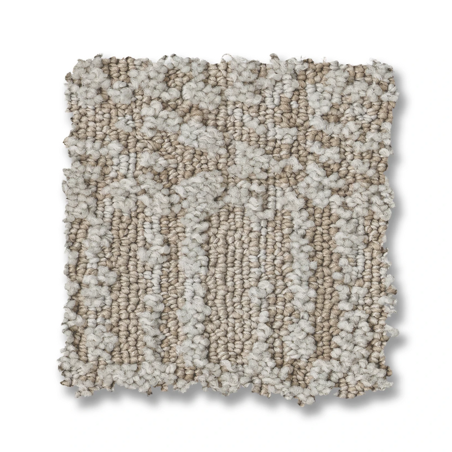 Batique On Trend Carpet is a square swatch in beige and cream, featuring a mix of looped and cut fibers for a subtle, abstract pattern. The edges are slightly uneven.