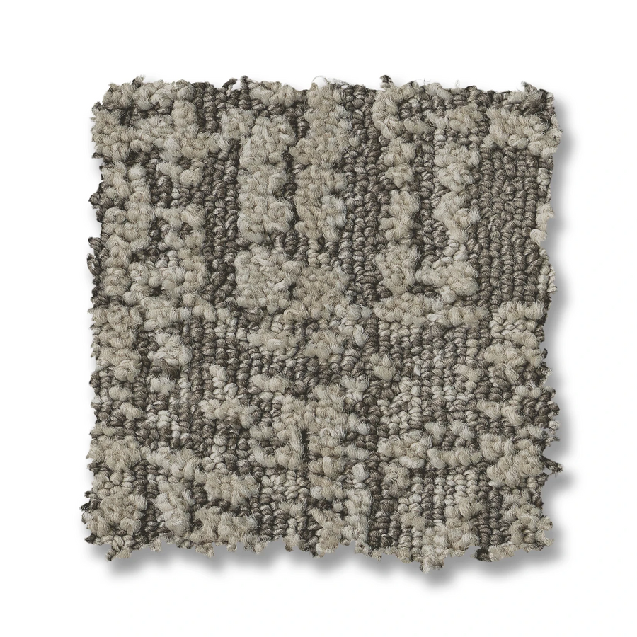 The Batique On Trend Carpet swatch is square with a textured abstract pattern in beige and gray, featuring both looped and cut pile fibers, and slightly uneven edges against a white background.