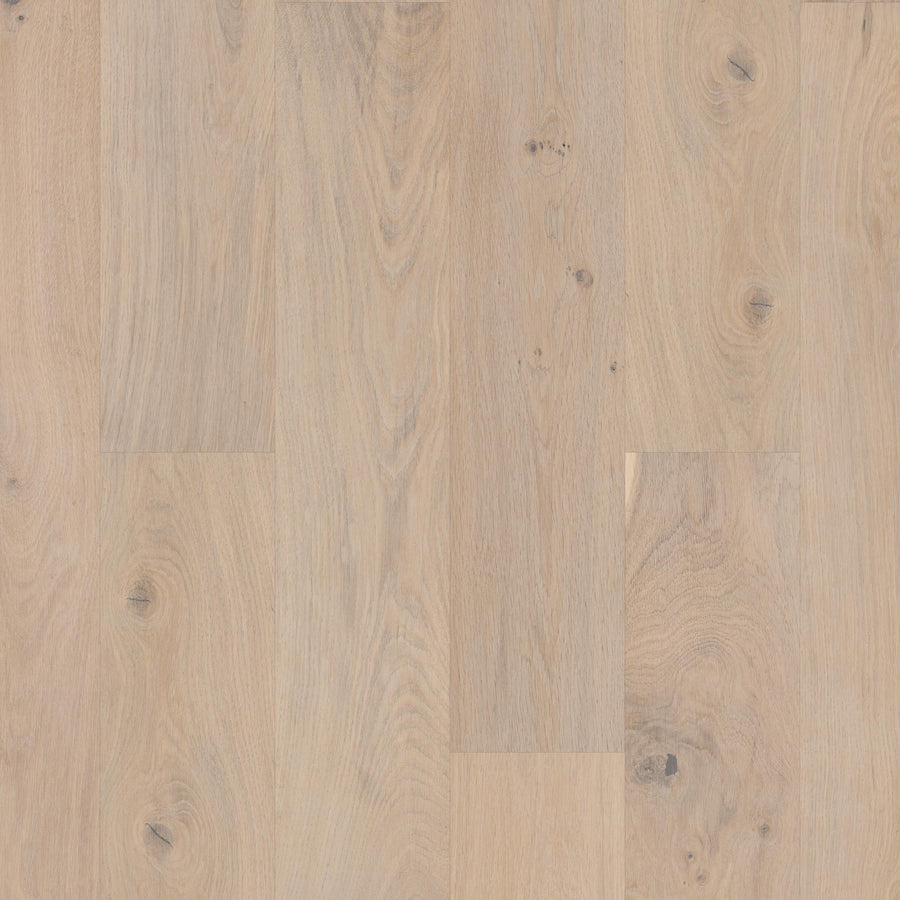 Biltmore Hickory & White Oak 7 1/2" Hardwood features light-colored planks with natural grain and knots, arranged in a staggered layout and finished with low gloss for an elegant look.