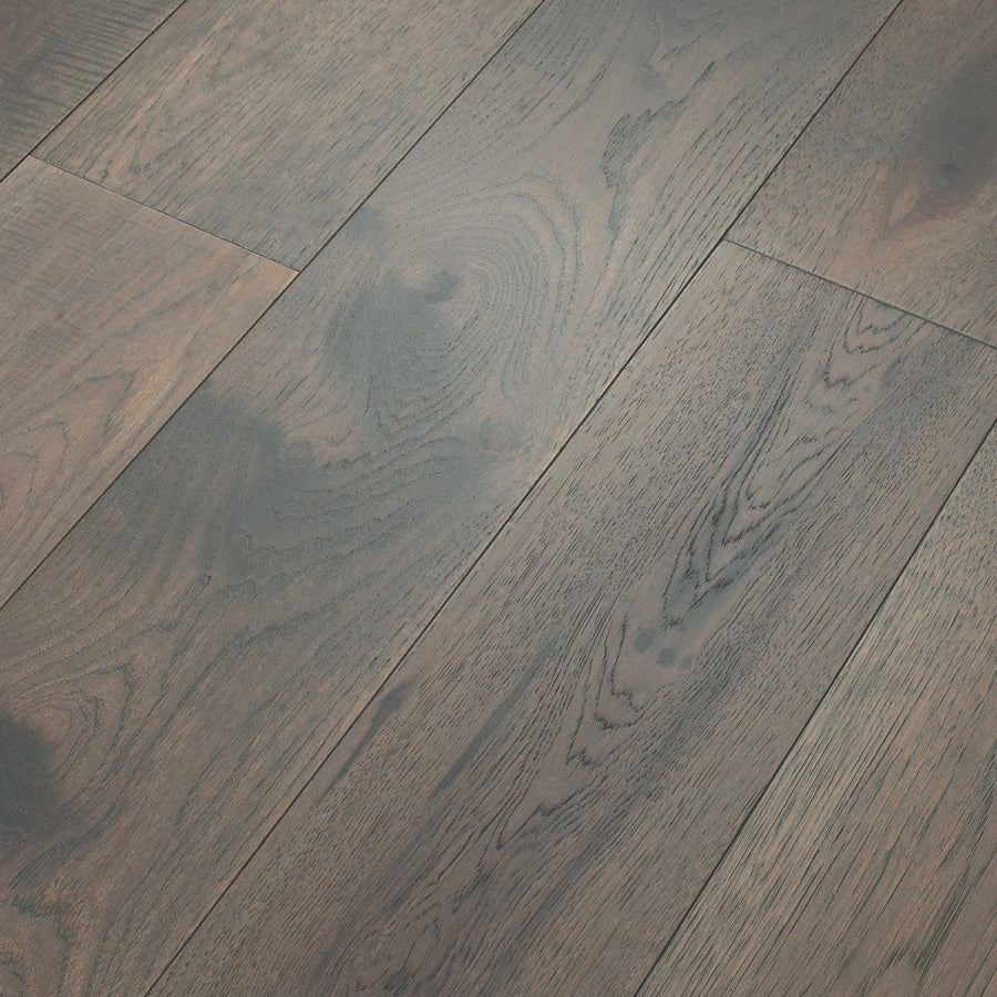 Close-up of Birmingham Pecan 7 1/2" Hardwood shows detailed grain and natural texture in a staggered layout. The smooth, subtly glossy finish enhances the rich color variations of the wood.