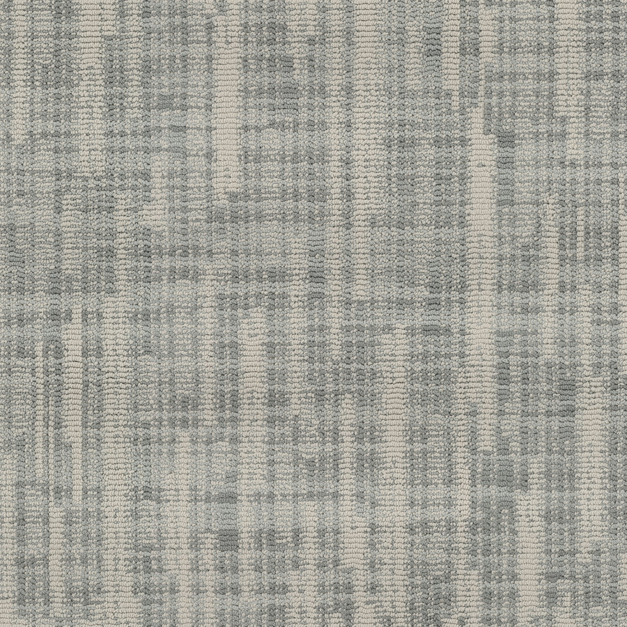 The Blurred Lines On Trend Carpet showcases intersecting grey and off-white lines, inspired by photography, for a textured, woven grid appearance.