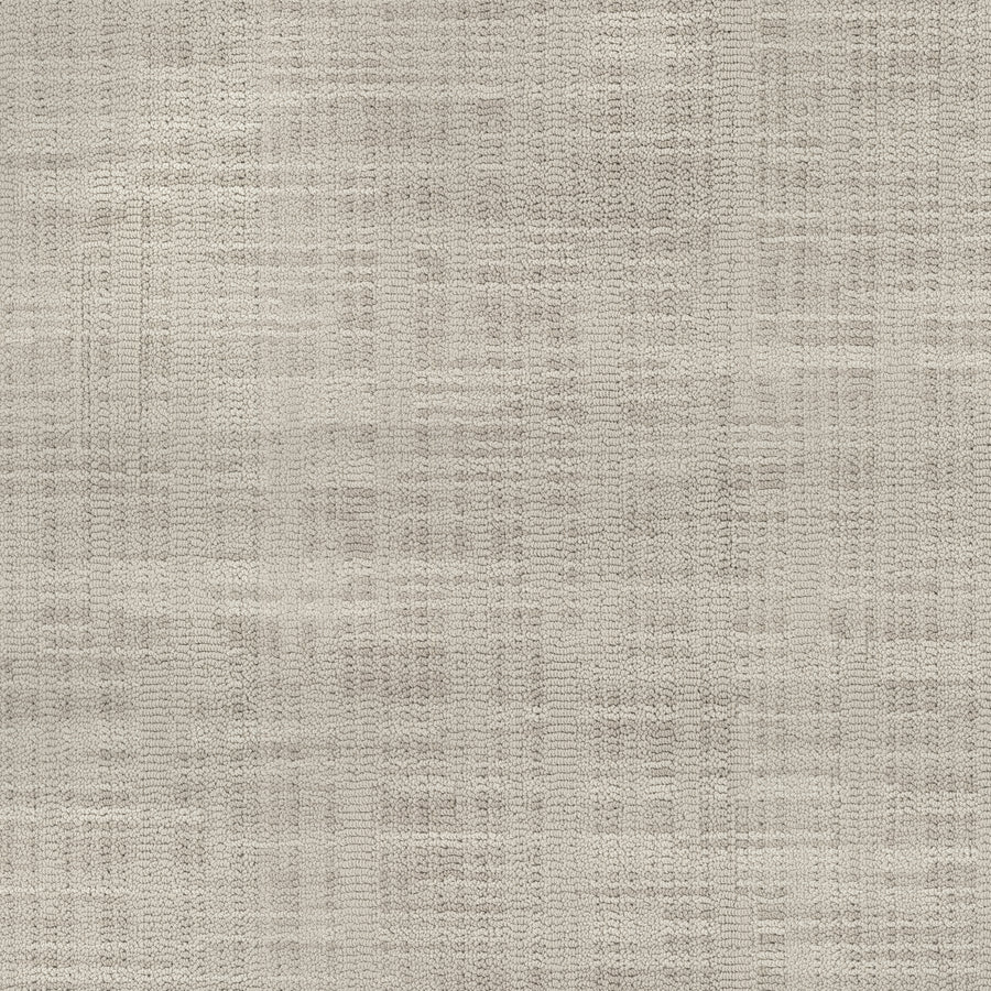 A close-up of the Blurred Lines On Trend Carpet showcases its textured, woven beige fabric with a subtle crisscross pattern and soft, neutral tones for a natural, understated look.
