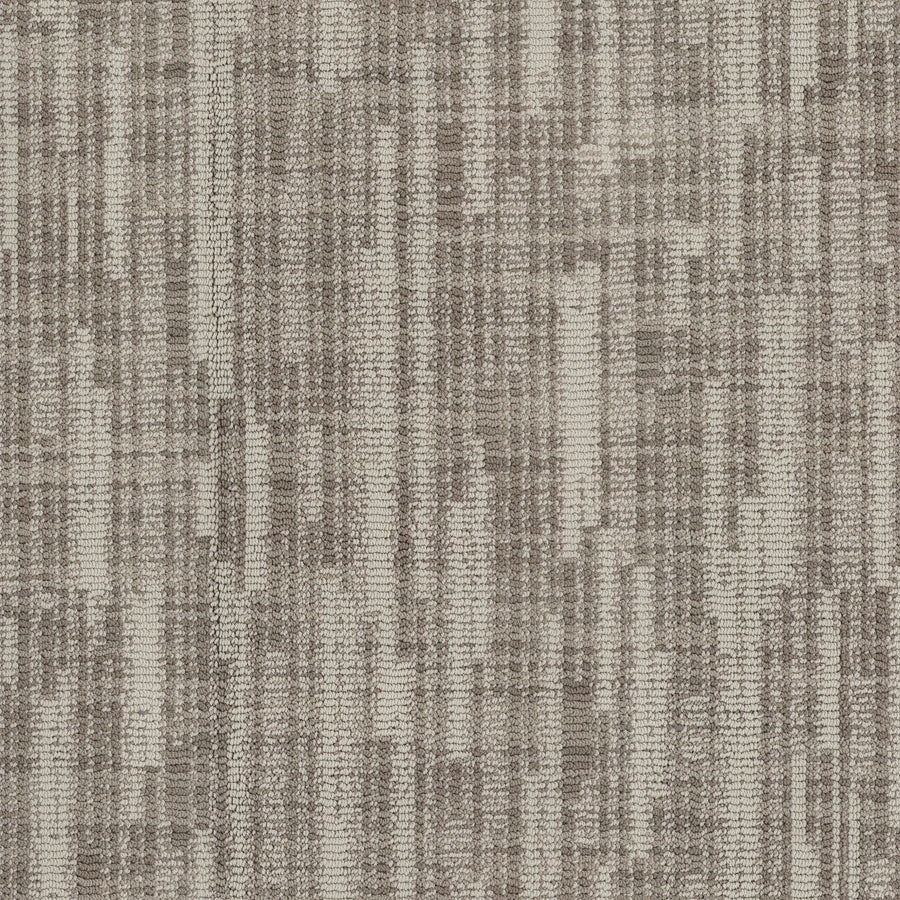 A close-up of the Blurred Lines On Trend Carpet showcases its modern, abstract woven pattern in beige and brown tones, with vertical and horizontal lines inspired by photography.