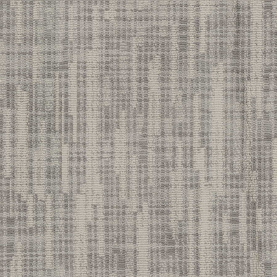 A close-up of Blurred Lines On Trend Carpet shows its abstract woven pattern in gray and beige tones, crafted from EnVision Nylon for a modern, neutral look inspired by photography.