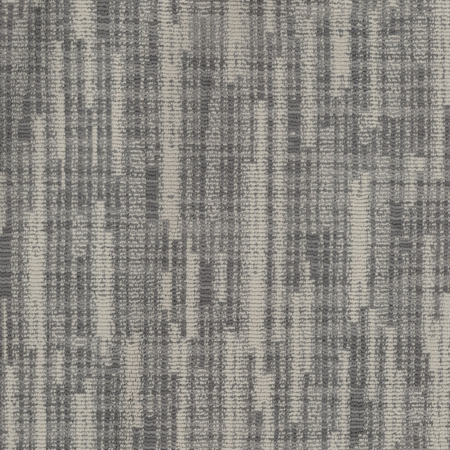 A close-up of the Blurred Lines On Trend Carpet highlights its woven pattern and intricate texture, inspired by photography.