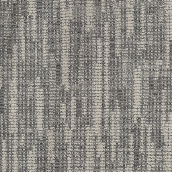 A close-up of the Blurred Lines On Trend Carpet highlights its woven pattern and intricate texture, inspired by photography.