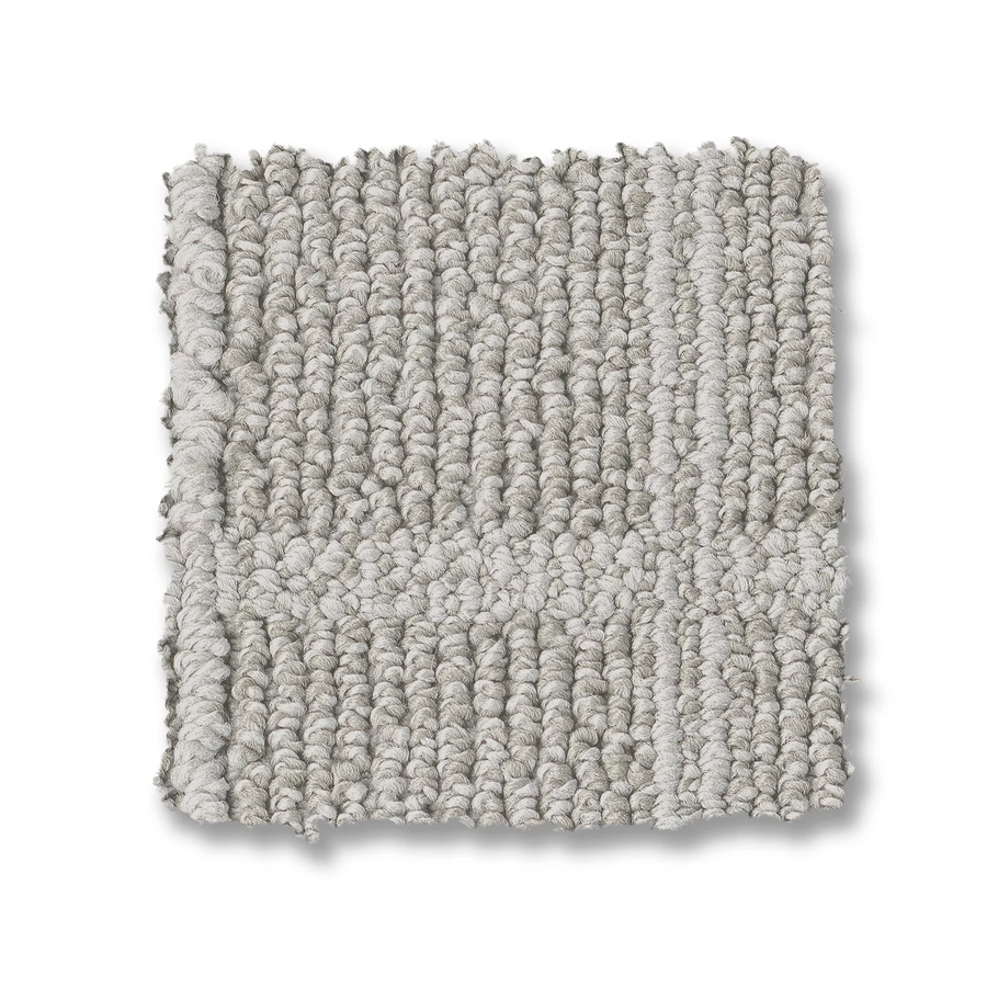 A square swatch of Breeze Block Berber Carpet in light gray, featuring tightly looped fibers and a subtle windowpane pattern, shown on a white background.