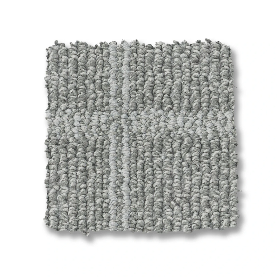 A square swatch of Breeze Block Berber Carpet in light gray with a subtle grid pattern, photographed on a white background.