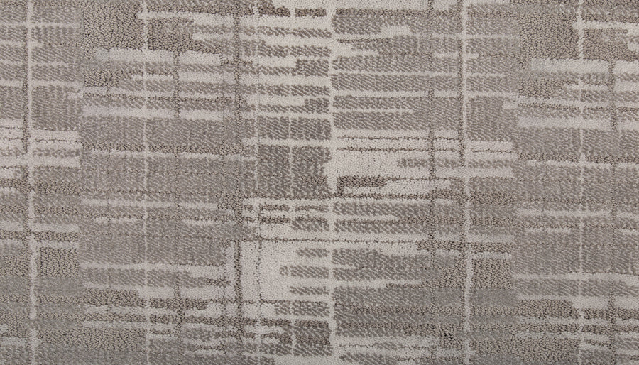 Close-up of Tartan Veil On Trend Carpet, showcasing an abstract geometric pattern in gray and white with intersecting lines and rectangles—an elegant flooring choice for modern interiors.
