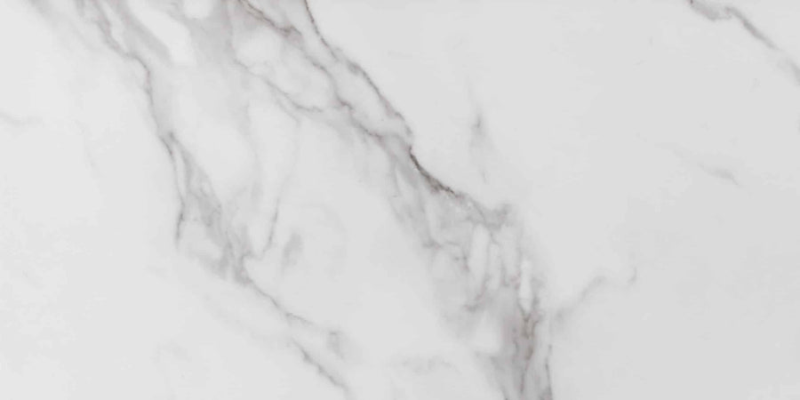 The Buckingham Palace 12x24 Porcelain Tile features a modern marble look with white and gray tones, subtle grey veins, and natural diagonal patterns. Its matte finish adds timeless style and elegance to any space.