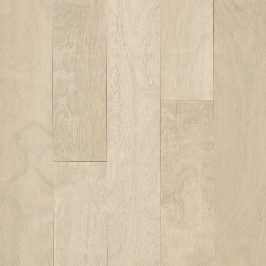 Canyon Creek Birch 6.5" Hardwood features light-colored panels with natural wood grain and tonal variation, arranged in a staggered pattern. The smooth, polished surface gives any space a refined finish.