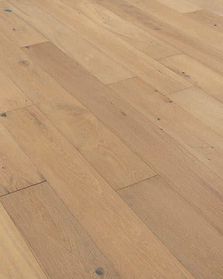 Riverside European Oak 7" Hardwood features light brown engineered planks with natural grain patterns and knots, arranged in a parallel layout.