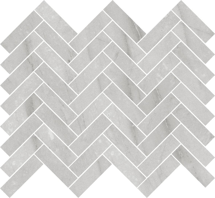 Royal Marbles II 1x3 Herringbone tiles feature a gray marble-look surface, arranged in a classic herringbone pattern with white grout lines, creating an elegant zigzag design and subtle marble-like texture.