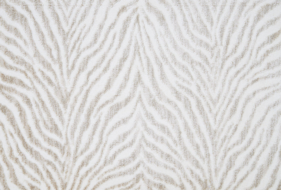 The Boteti On Trend Carpet showcases soft beige and white wavy stripes in a textured, symmetrical design—ideal for adding an animal-inspired accent to modern décor.