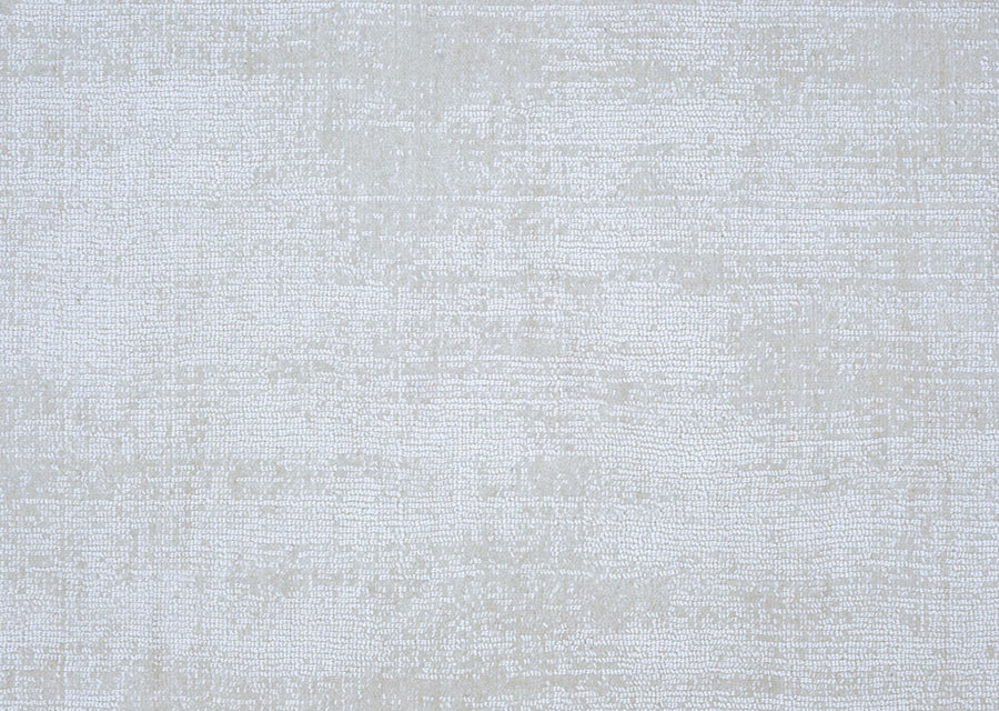 Prague On Trend Carpet features a light grey, woven fabric pattern inspired by modern color palettes. Its soft, uniform texture creates a neutral and minimalist background ideal for contemporary spaces.