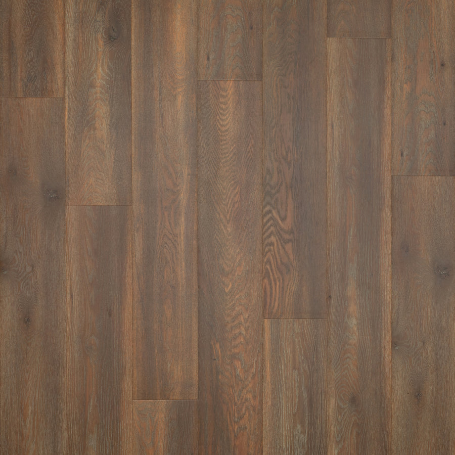 Close-up of Miramar Cliffs 8.34" Waterproof Laminate planks in dark brown with natural grain and subtle color variations, arranged in a staggered pattern for scratch protection and a warm, rustic luxury home look.