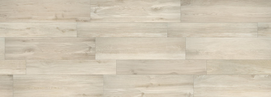 Corsica 8x48 Porcelain Tile features a light wood-look design with natural grain texture and varied beige tones. Laid in a staggered pattern, it offers a subtle, uniform look ideal for modern home décor.