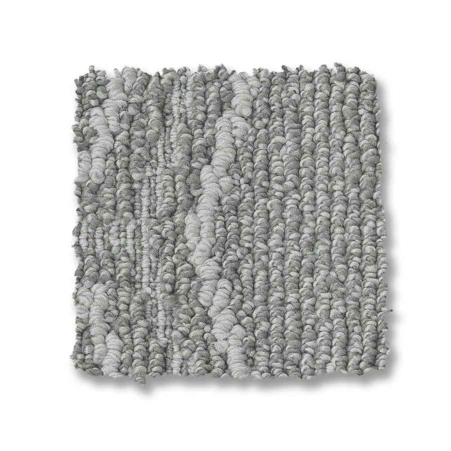 The Cozy Cable Berber Carpet in grey features a square pattern and sturdy looped cable design, making it ideal for high-traffic areas.