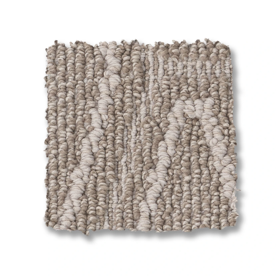 A square sample of Cozy Cable Berber Carpet, shown on a white background, features light and medium beige tones with a subtle wavy pattern. The durable looped cable design makes it ideal for high-traffic areas.