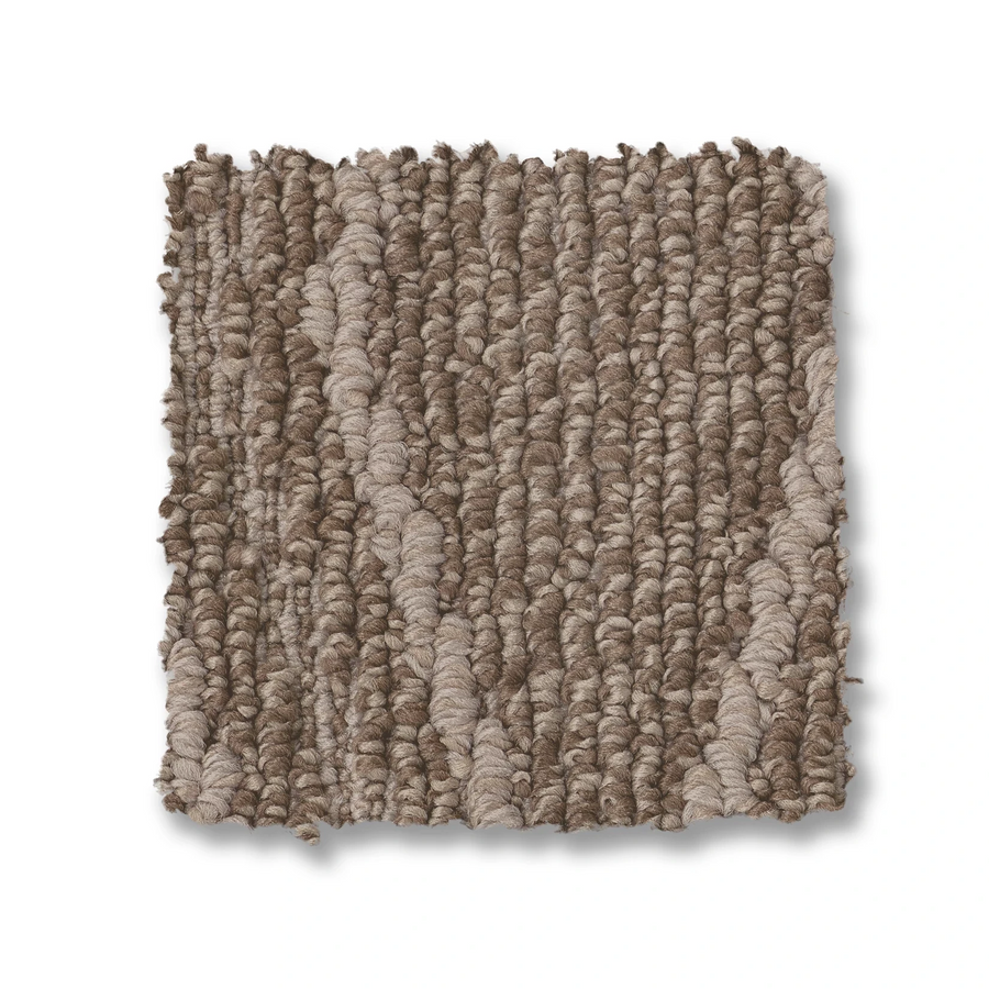 The Cozy Cable Berber Carpet sample is square with a textured, durable looped pile in beige and light brown shades, featuring subtle vertical patterns—perfect for high-traffic areas and adding warmth to any space.