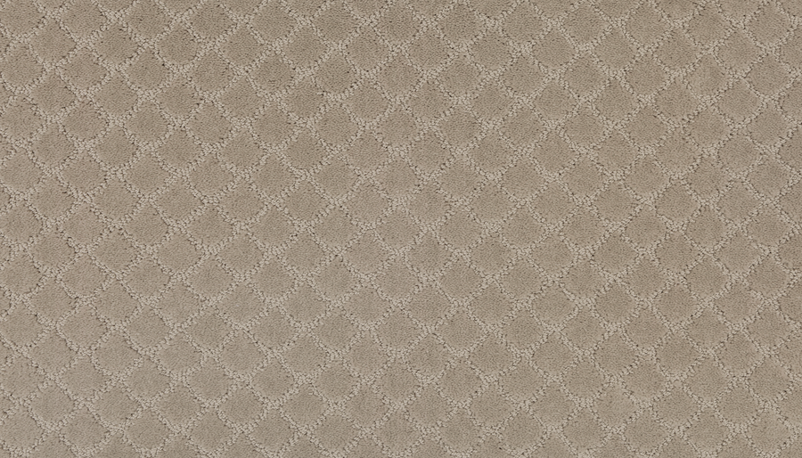 Close-up of the Design Paradise Family Friendly Carpet in earth tones, featuring a diamond-shaped pattern with raised textured lines for a repeating geometric design.