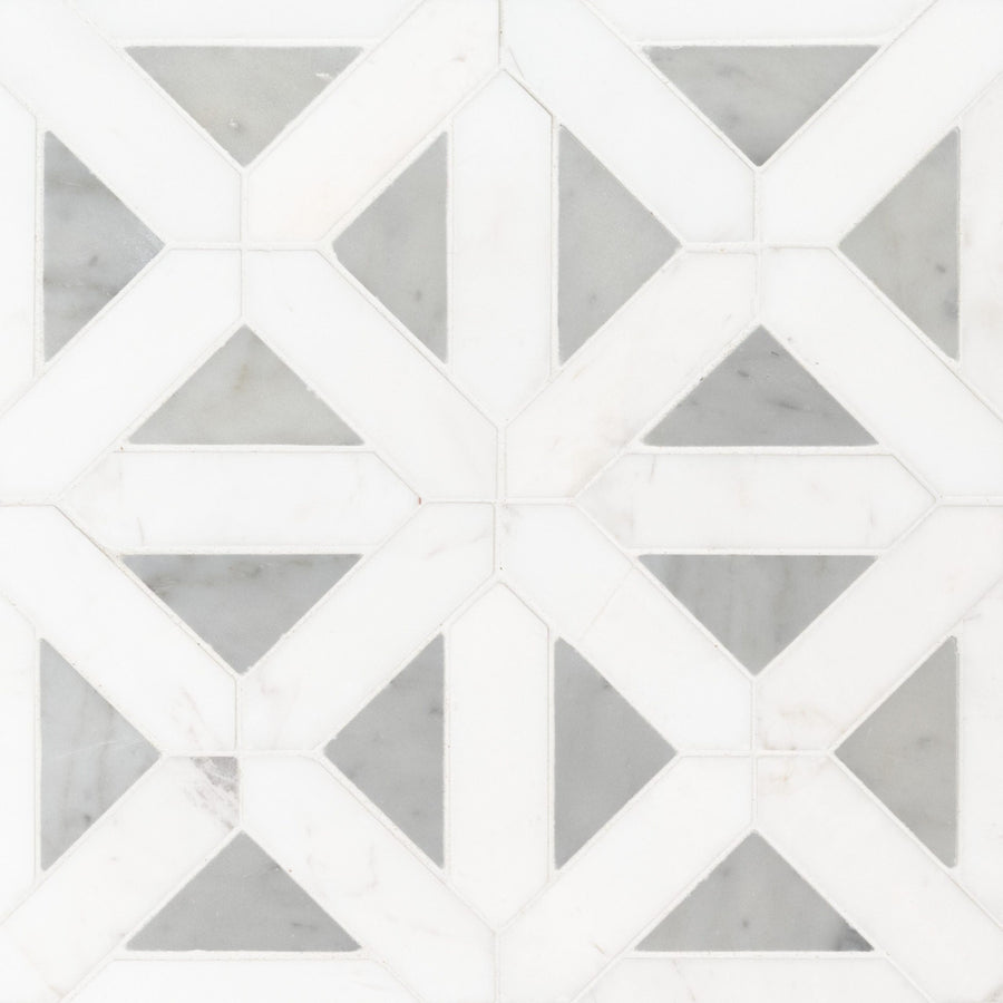 Dolomite Geometrica Mosaic Natural Stone features interlocking geometric shapes with gray accents, offering a symmetrical, modern look that makes it an ideal choice for a stunning backsplash tile.