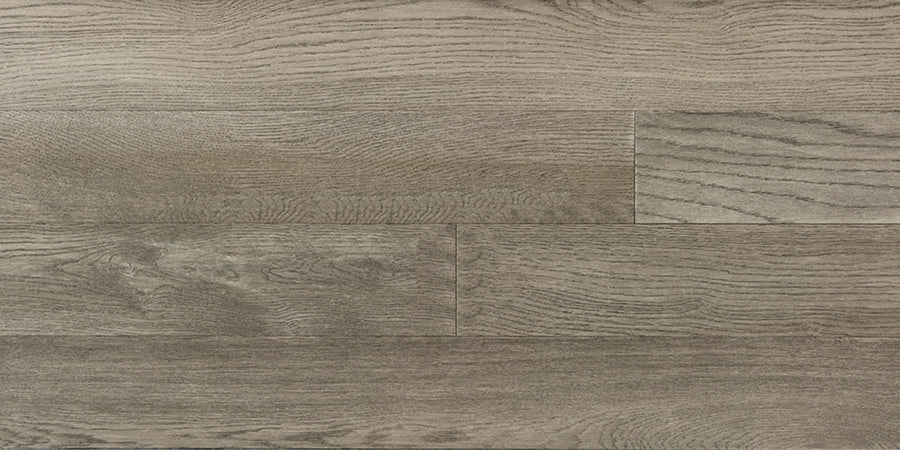 Dorchester White Oak 6 1/2" Hardwood features light brown engineered planks with wide widths, visible grain patterns, and subtle tone variations for a natural, rustic look.