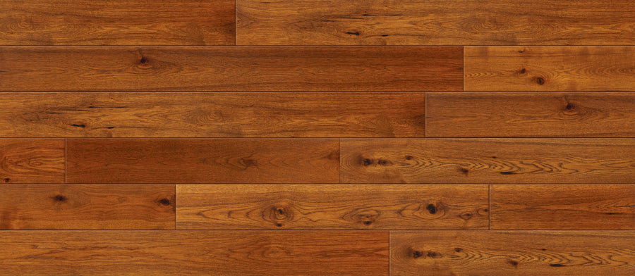Close-up of Entourage 7 1/2" Hickory Hardwood flooring in a staggered layout, showcasing rich brown tones, visible grain, knots, and a wire-brushed finish—perfect for high-traffic areas.