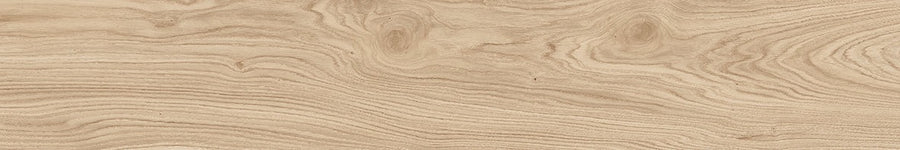 The Prestige 8x48 Wood Plank Tile features a light brown natural finish with swirling grain patterns and knots, creating the authentic texture and look of contemporary wood flooring.