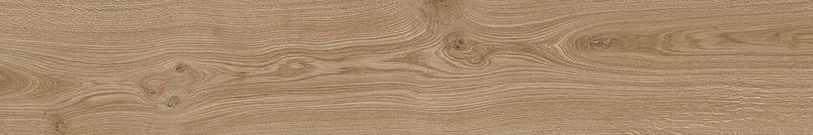 A close-up of light brown wood grain inspires the Prestige 8x48 Wood Plank Tile, offering a contemporary flooring solution that captures the natural finish and texture of real wood.