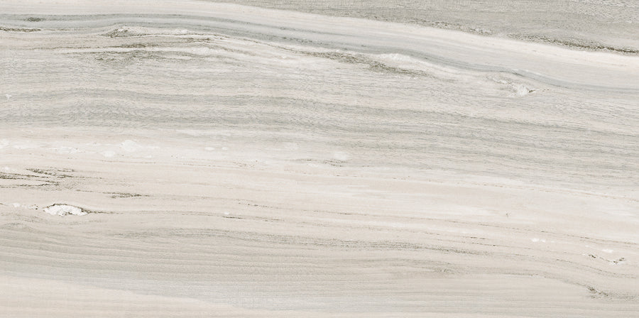 A close-up of the Element 12x24 Matte Tile shows its light marble look with wavy gray ribbons and textured patterns, making it an ideal neutral tile choice for modern spaces.