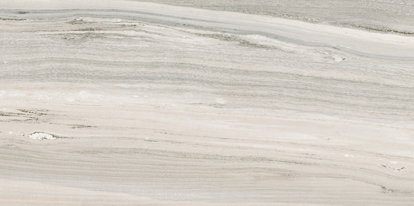 A close-up of the Element 12x24 Matte Tile shows its light marble look with wavy gray ribbons and textured patterns, making it an ideal neutral tile choice for modern spaces.